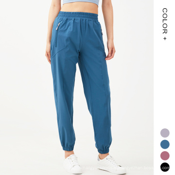 Эластичная талия обновлена ​​брюки jogger Женщины быстро сухие спортивные штаны Женщины активная одежда бегуна с Zip Pocket